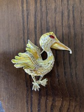 Broche métal doré marque - broche,